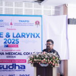 Dr. Sabari Nath delivering a talk on the essentials of a laryngology clinic at the Voice & Larynx Conference in Erode.